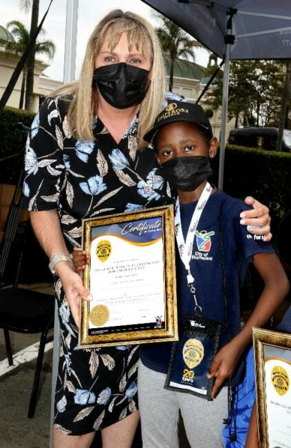 Ekurhuleni Executive Mayor Ald T Campbell and Honorary EMPD Officer Award recipient and Reach for a Dream EMPD Award Recipient